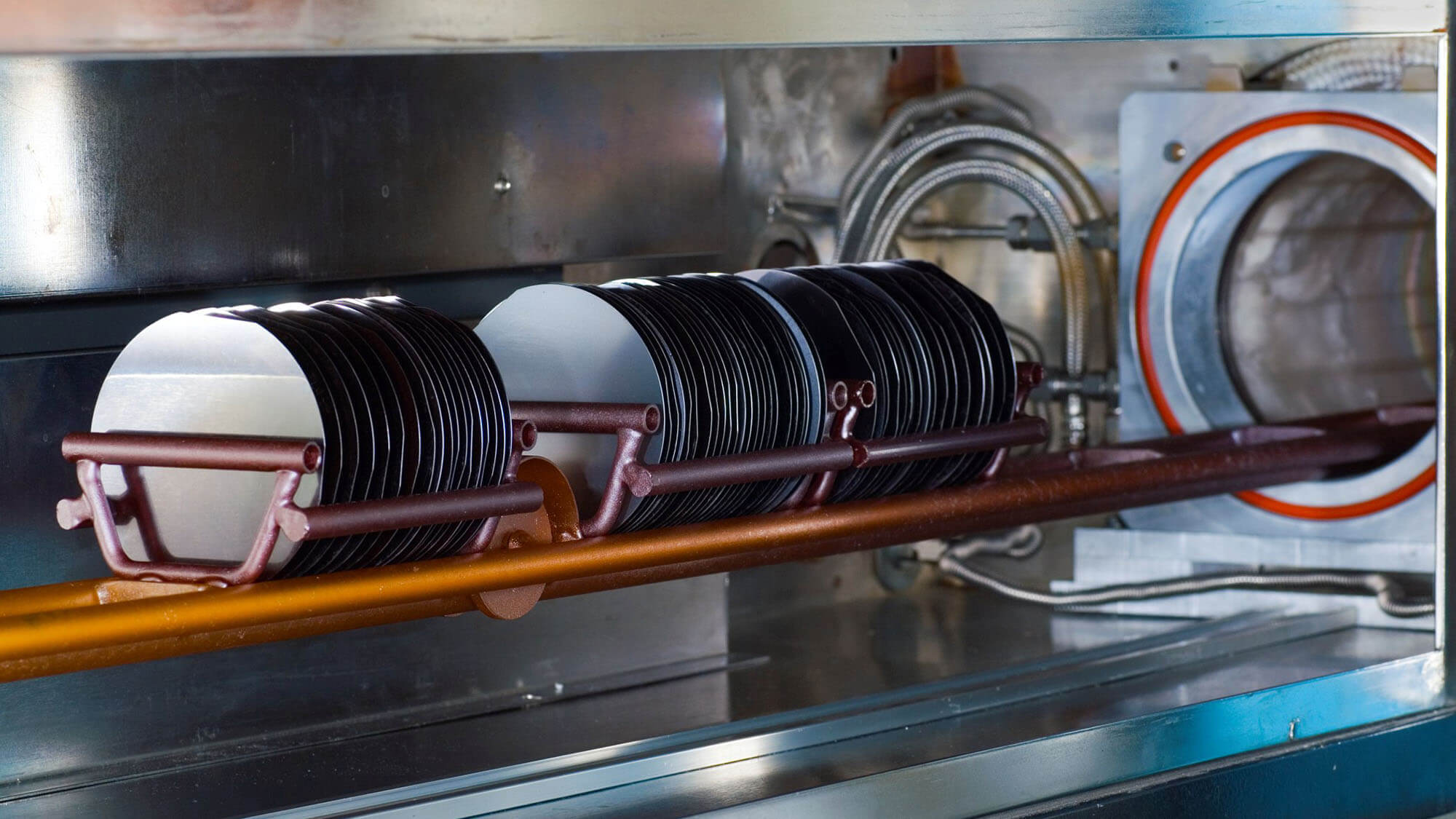 Silicon wafers on a horizontal batch reactor in a high-tech lab